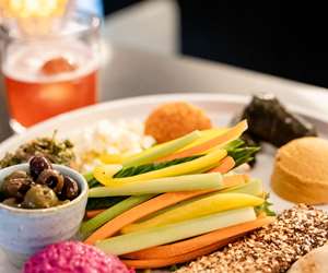 mezze plate with veggies, hummus and olives