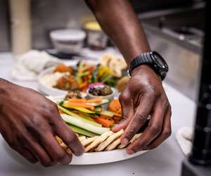 chef preparing a mezze plate